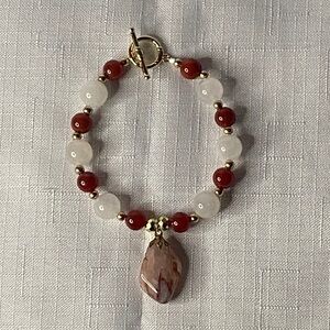 Elegant Gold and Red Beaded Bracelet